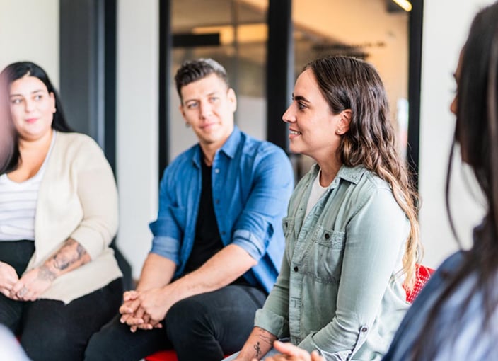 Person talking in a support group
